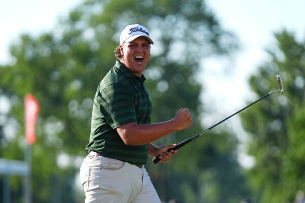Aldrich Potgieter, of South Africa celebrates his winning putt in a playoff during the final round of the Rocket Classic golf tournament at the Detroit Golf Club, Sunday, June 29, 2025, in Detroit. (AP Photo/Paul Sancya)