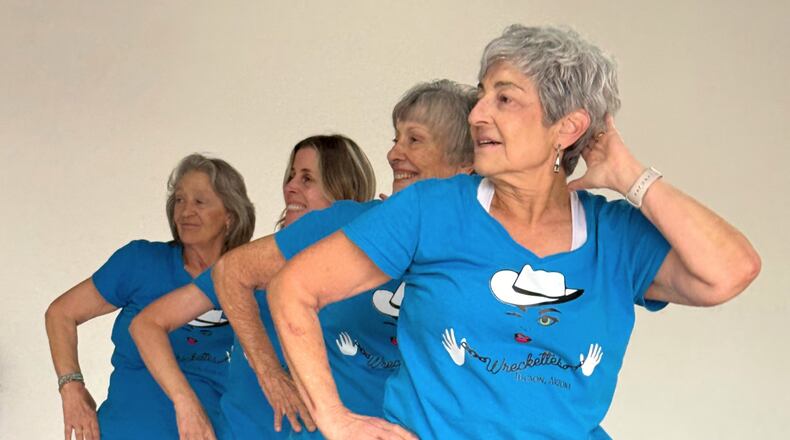 Gail Kowalski, from left, Suzy Rhoades, Carol Ross and Cindy Soffrin, of The Rodeo City Wreckettes, a tap and jazz dance group for older women, practice on Thursday, April 16, 2026, in Tucson, Ariz. (Anita Snow via AP)