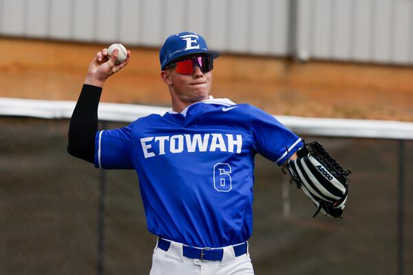 Etowah outfielder Trevor Condon practices throwing before the game against Harrison High School during the High School Baseball Playoffs at Etowah High School in Woodstock on April 24, 2026. (Arvin Temkar/AJC)