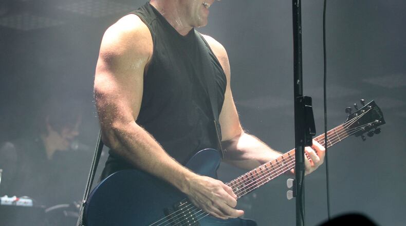 Nine Inch Nails frontman Trent Reznor performing at Philips Arena in 2013. (Akili-Casundria Ramsess/Special to the AJC)