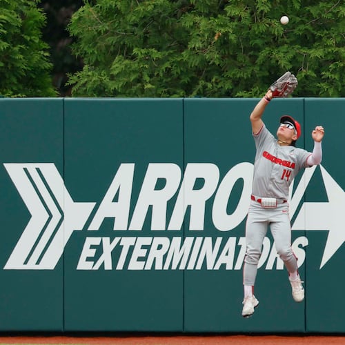 Georgia Bulldog Kenny Ishikawa goes up to make a catch for an out during the third inning of their Game 2 of the NCAA Super Regional at Foley Field on Sunday, June 7, 2026, in Athens. (Miguel Martinez/AJC)