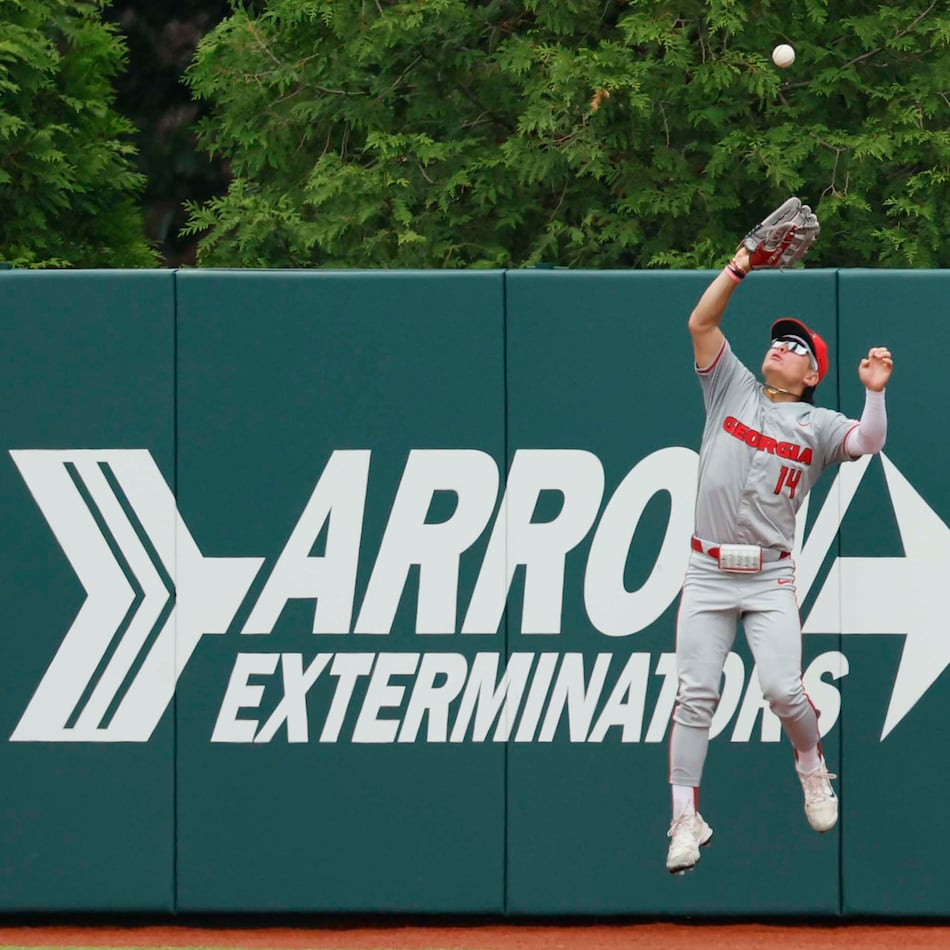 Georgia Bulldog Kenny Ishikawa goes up to make a catch for an out during the third inning of their Game 2 of the NCAA Super Regional at Foley Field on Sunday, June 7, 2026, in Athens. (Miguel Martinez/AJC)