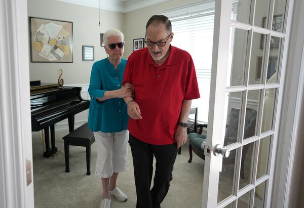 Doris Tyler (left) is helped by her husband, Don, in their home in Hendersonville, Tenn. The couple claimed in a lawsuit that the risks of Doris' stem cell procedure were not made clear. “You’re going to improve, or you’re going to stay the same — they promised that. What do you have to lose?” Don Tyler said. (John Partipilo for the AJC) 