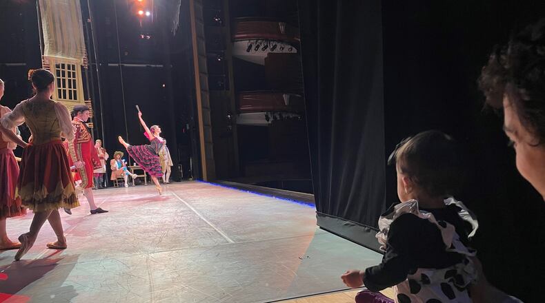 Emily Carrico performs in “Don Quixote,” while Sergio Masero and daughter Alina watch from the wings. Courtesy of Serena Chu