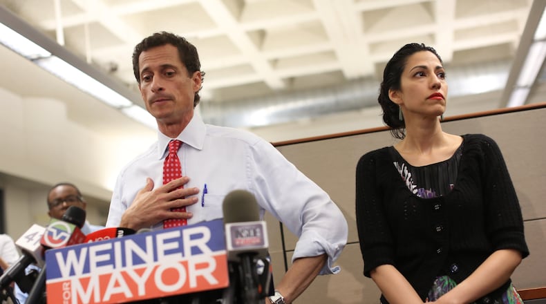 New York City Mayoral candidate Anthony Weiner, with his wife Huma Abedin, during a news conference where addressed revelations that he continued sending raunchy images of himself in online chats after his resignation from Congress in 2011, at the offices of Gay Men’s Health Crisis in New York, July 23, 2013. Abedin announced on Aug. 29, 2016, that the couple were separating in the wake of a report that Weiner had been involved in another sexting scandal. (Michael Appleton/The New York Times)