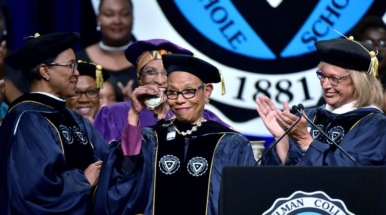 SPELMAN PRESIDENT INSTALLED--April 9, 2016 Atlanta - Dr. Mary Schmidt Campbell shows her medallion during Spelman College 2016 Investiture Ceremony at Georgia World Congress Center on Saturday, April 9, 2016. Mary Schmidt Campbell, former dean emerita of the Tisch School of the Arts at New York University, was installed as its 10th president of Spelman College on Saturday at the Georgia World Congress Center. HYOSUB SHIN / HSHIN@AJC.COM