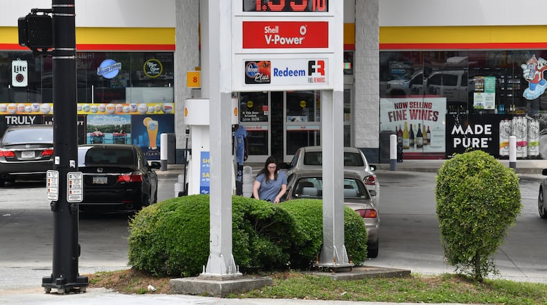 June 7, 2022 Atalnta - A customer pumps gas at Shell gas station, where the regular price of gasoline approaches close to $5 a gallon, on Peachtree Road near Piedmont Atlanta Spine Center in Buckhead on Tuesday, June 6, 2022. Georgia gas prices hit new heights on Tuesday, according to AAA, with an average statewide cost of $4.33 for a gallon of regular unleaded fuel. That’s still well below the national average of $4.92 per gallon.(Hyosub Shin / Hyosub.Shin@ajc.com)