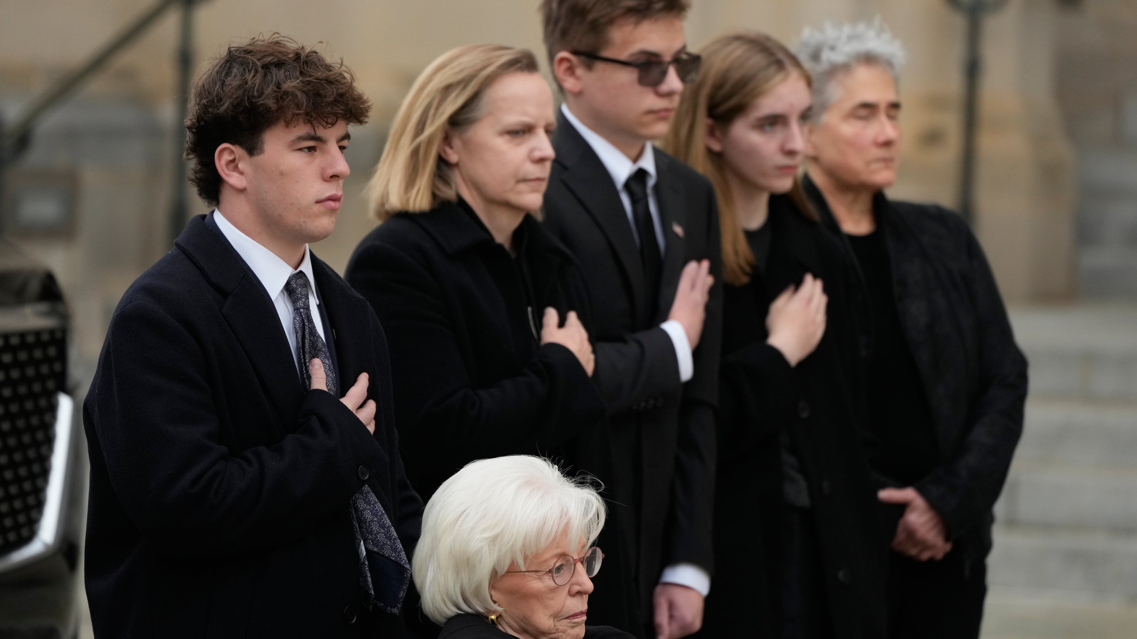 Wife of former Vice President Dick Cheney, Lynne Cheney in wheelchair, along with family preside over the arrival of the casket of former Vice President Dick Cheney at the Washington National Cathedral, Thursday, Nov. 20, 2025, in Washington. (AP Photo/Mark Schiefelbein)