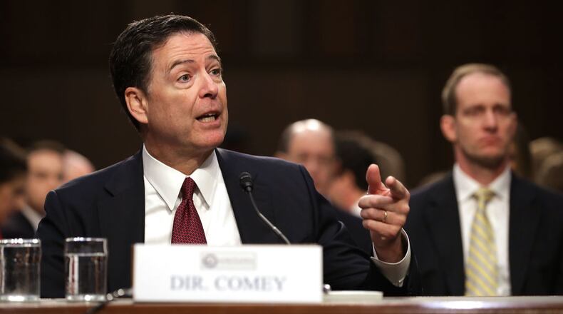 Former FBI Director James Comey testifies before the Senate Intelligence Committee in the Hart Senate Office Building on Capitol Hill June 8, 2017 in Washington, DC. Comey said that President Donald Trump pressured him to drop the FBI's investigation into former National Security Advisor Michael Flynn and demanded Comey's loyalty during the one-on-one meetings he had with president. (Photo by Chip Somodevilla/Getty Images)