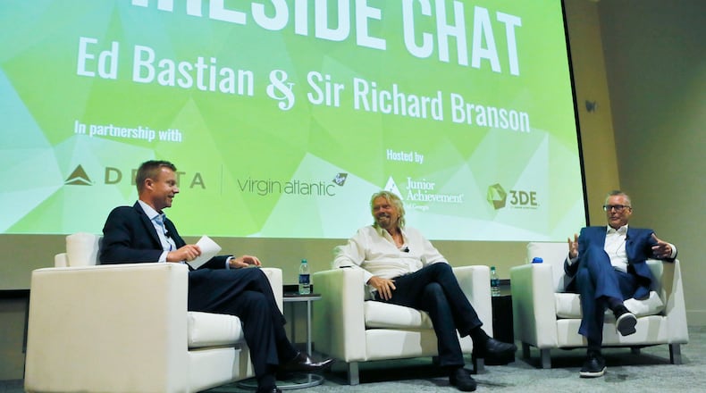 Delta CEO Ed Bastian and Virgin founder Richard Branson held a "fireside chat" event moderated by Junior Achievement of Georgia president Jack Harris at the Georgia World Congress Center.    BOB ANDRES  /BANDRES@AJC.COM