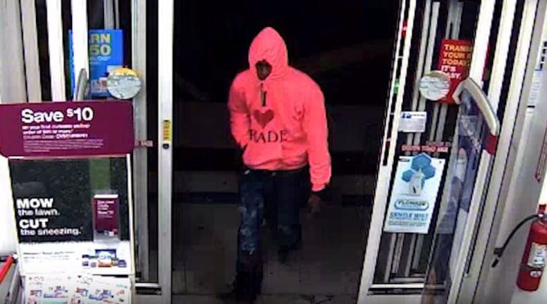 Surveillance footage shows two alleged armed robberies that took place at 1943 Peachtree Road.