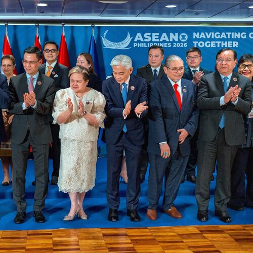 Front row, from left, Thailand Deputy Prime Minister and Foreign Minister Sihasak Phuangketkeow, Timor-Leste Foreign Minister Bendito dos Santos Freitas, Vietnam Deputy Foreign Minister Dang Hoang Giang, Philippines Foreign Secretary Theresa Lazaro, Singapore Permanent Secretary of Foreign Affairs Albert Chua, Brunei Foreign Minister Erywan Yusof, Cambodia Deputy Prime Minister and Foreign Minister Prak Sokhonn, and Indonesia Director General for ASEAN Cooperation Ina Hagniningtyas Krisnamurthi clap after posing for a photo with representatives from the ASEAN Intergovernmental Commission on Human Rights (AICHR) Representatives during the ASEAN Foreign Ministers' Meeting at the Philippine International Convention Center, Monday July 20, 2026 in Pasay, Metro Manila, Philippines. (Ezra Acayan/Pool Photo via AP)