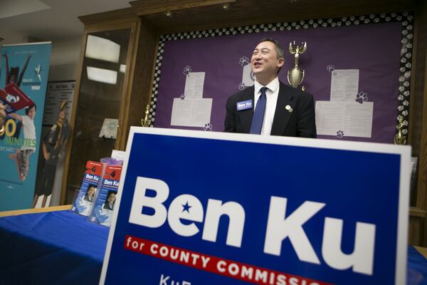 10-02-18 - Berkeley Lake, GA - Ben Ku, candidate for county commissioner, speaks with constituents at a candidate forum at Berkeley Lake Elementary School on Tuesday, Oct. 2, 2018. (Casey Sykes for The Atlanta Journal-Constitution)