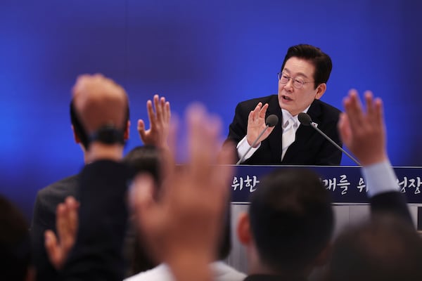 South Korean President Lee Jae Myung takes questions during a news conference to mark 100 days in office at the Blue House in Seoul, South Korea, Sept, 11, 2025. (Kim Hong-Ji/Pool Photo via AP)