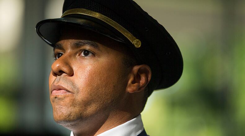 Pensacola, Florida -- Former Ace camp student and now Delta pilot Jerome Wellons answers questions from the media during the 20th annual Delta Air Lines' "dream flight" aviation Summer camp in Pensacola, Tuesday, July 16, 2019. (Alyssa Pointer/alyssa.pointer@ajc.com)