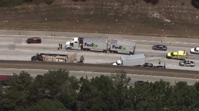 Three of four lanes were blocked, causing a 4-mile backup and a 65 to 75 minute delay. (CREDIT: Channel 2)