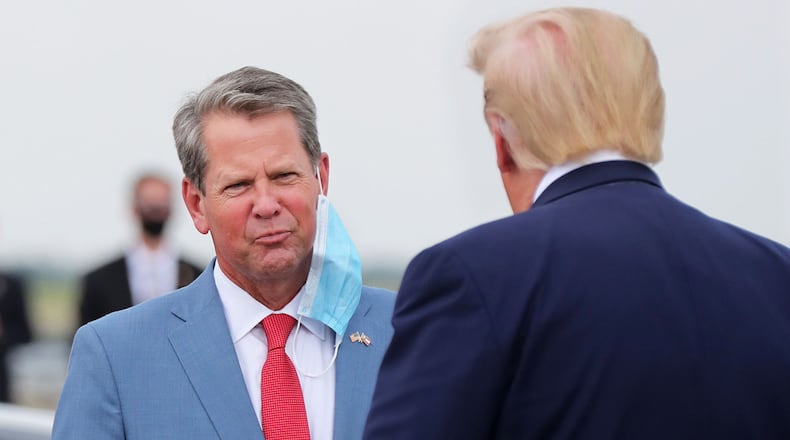 Gov. Brian Kemp, left, and former President Donald Trump both moved Thursday to mend an often difficult relationship. (Curtis Compton/Atlanta Journal-Constitution/TNS)