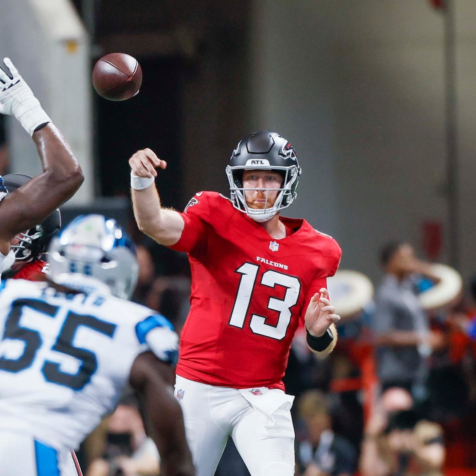 Atlanta Falcons quarterback Cooper Rush attempts a pass in the first half of an NFL game against the Carolina Panthers at Mercedes-Benz Stadium in Atlanta on Sunday, Sept. 20, 2026. (Miguel Martinez/AJC)