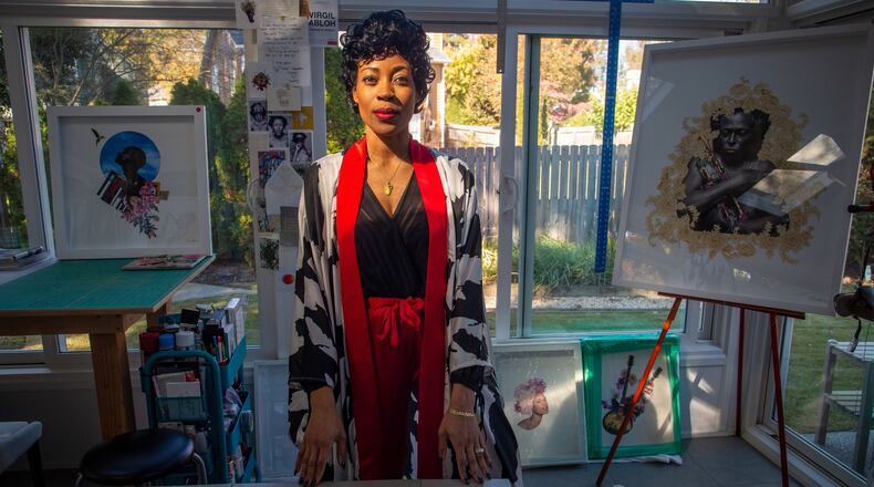 Artist Marryam Moma poses for a photograph in her Alpharetta studio Monday, November 8, 2021. STEVE SCHAEFER FOR THE AJC