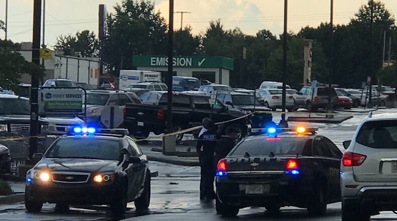 The shooting took place in a parking lot at Memorial Drive and Columbia Drive.