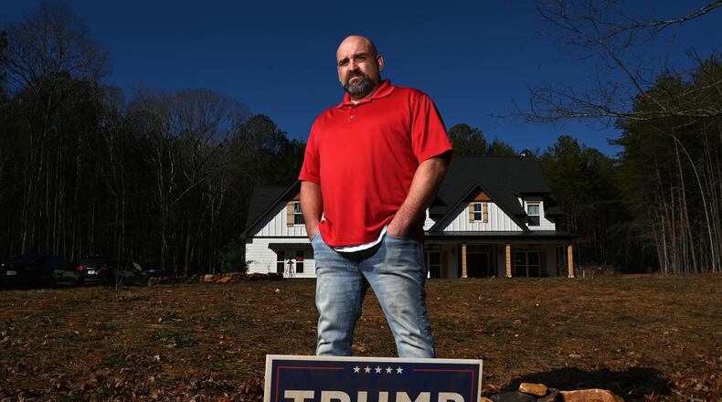 Portrait of Phillip "Bunky" Crawford at his home in Bremen on Dec. 19, 2024. Crawford was pardoned for activity on Jan. 6, 2021. (Hyosub Shin/AJC)