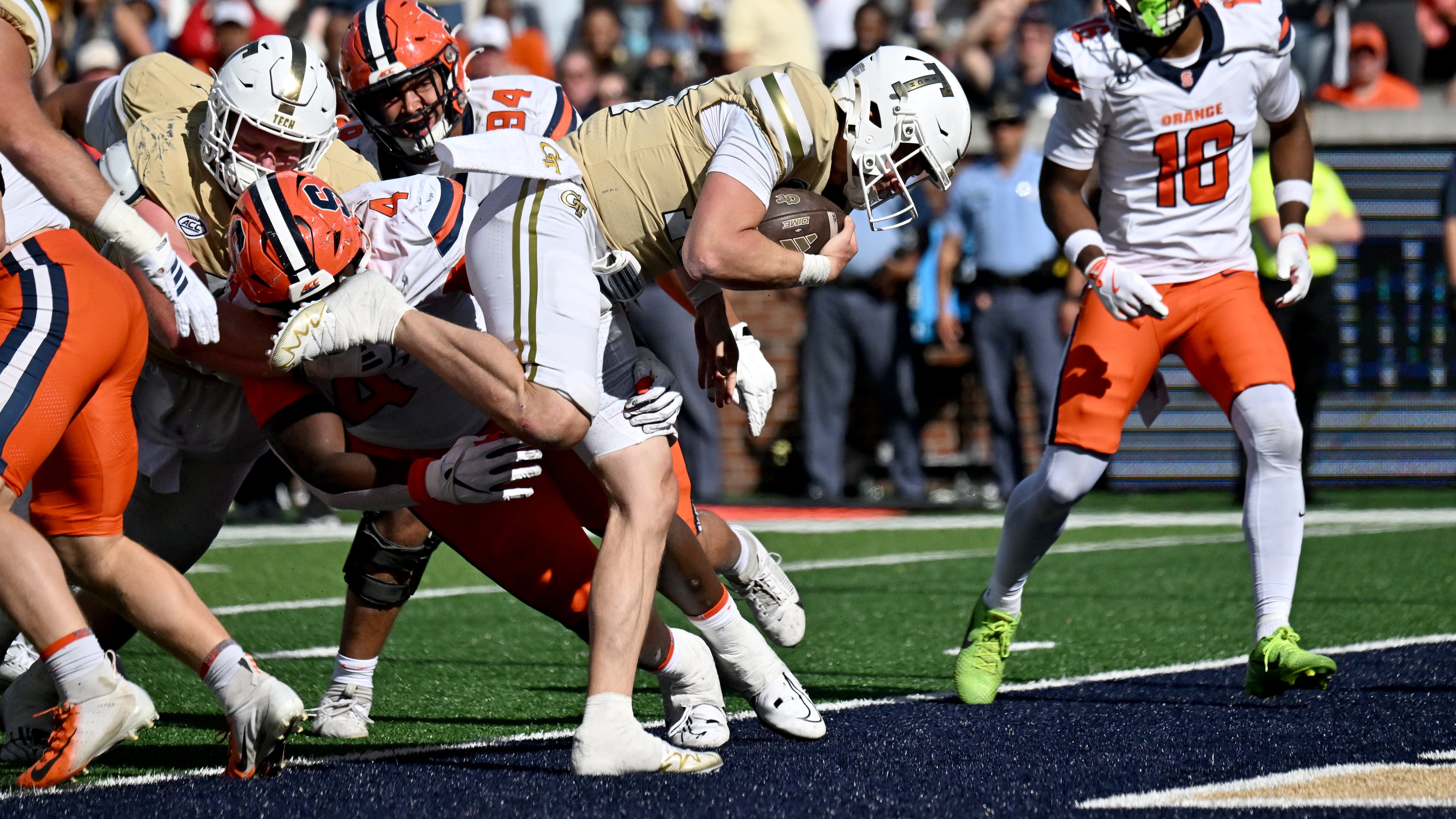 Georgia Tech quarterback Haynes King (10) pushes through for a touchdown during the second half in an NCAA college football game at Bobby Dodd Stadium, Saturday, October 25, 2025 in Atlanta. Georgia Tech won 41-16 over Syracuse. (Hyosub Shin/AJC)