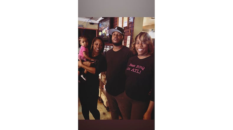 Lakesia Phelps (left), of Anna’s BBQ, with her granddaughter Cali, son-in-law Quan and daughter Destiney. CONTRIBUTED BY ANNA’S BBQ
