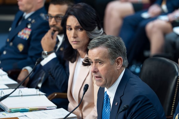 CIA Director John Ratcliffe, joined by Director of National Intelligence Tulsi Gabbard, testifies before the Senate Intelligence Committee on Capitol Hill in Washington on Tuesday.