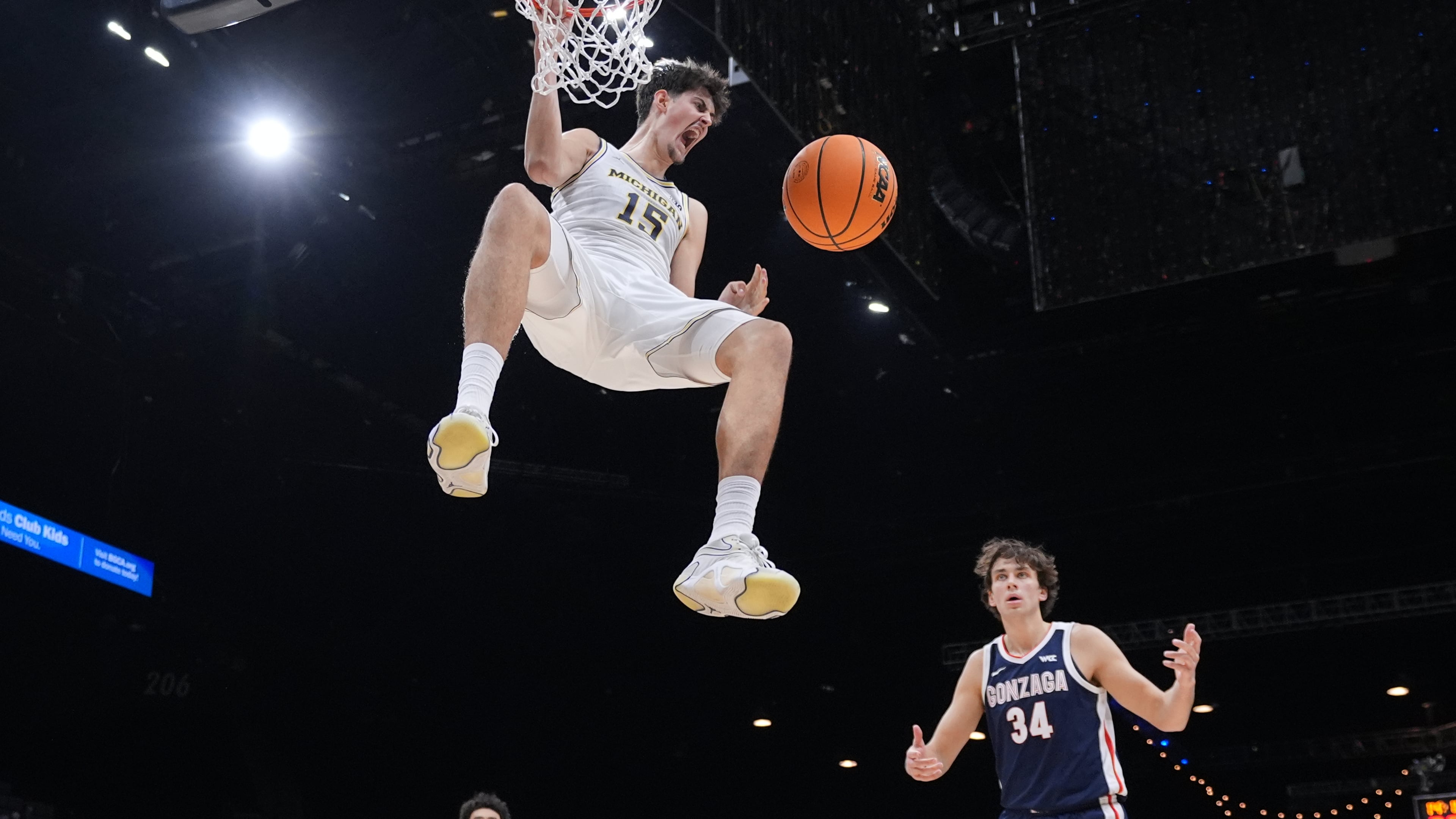 Michigan center Aday Mara (15) reacts as he scores against Gonzaga during the first half of an NCAA college basketball game in the Players Era tournament in Las Vegas, Wednesday, Nov. 26, 2025. (AP Photo/Eric Gay)