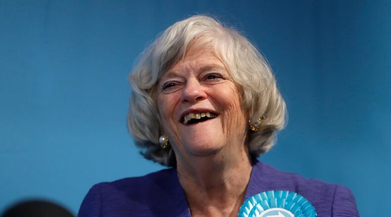 FILE -Ann Widdecombe, Brexit Party member, is interviewed after Nigel Farage, Leader of Britain's Brexit Party, spoke on stage at the launch of their policies for the General Election campaign, in London, Nov. 22, 2019. (AP Photo/Kirsty Wigglesworth, File)