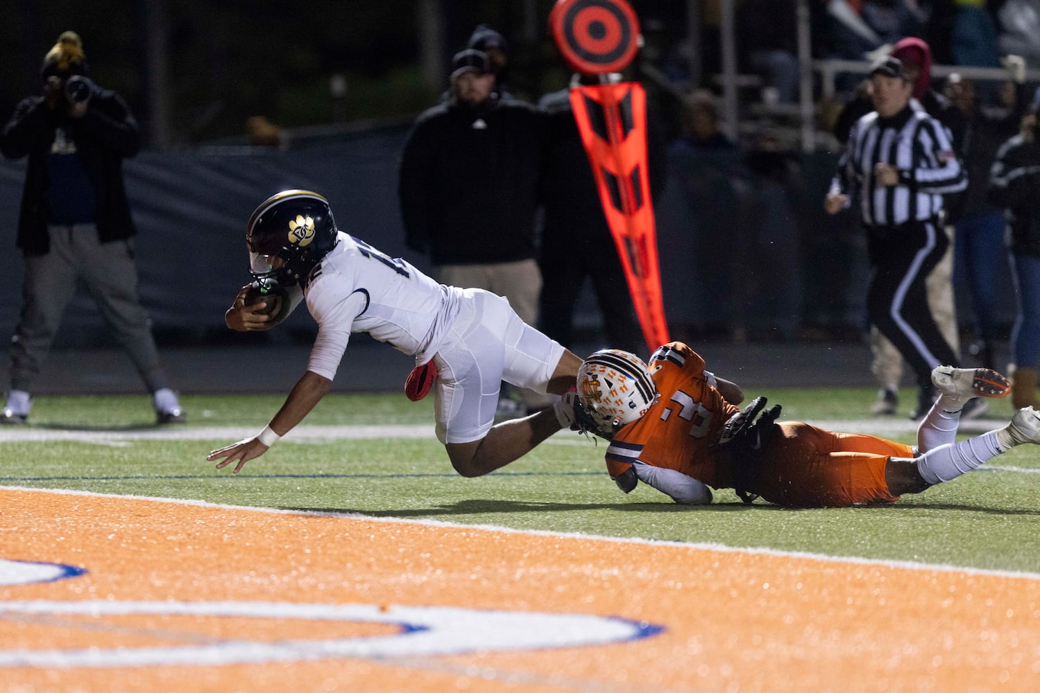 Douglas County quarterback DJ Bordeaux (12) scores a touchdown. (Photo/Jenn Finch, AJC)
