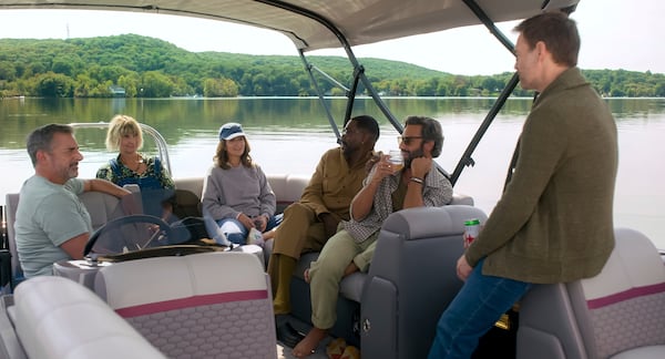 This image released by Netflix shows Steve Carell, Kerri Kenney, Tina Fey, Colman Domingo, Marco Calvani, and Will Forte in a scene from "The Four Seasons". (Netflix via AP)