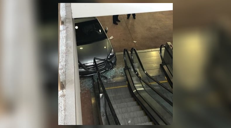 The stolen car crashed into the escalator of the Walmart Supercenter in Chamblee, police said.