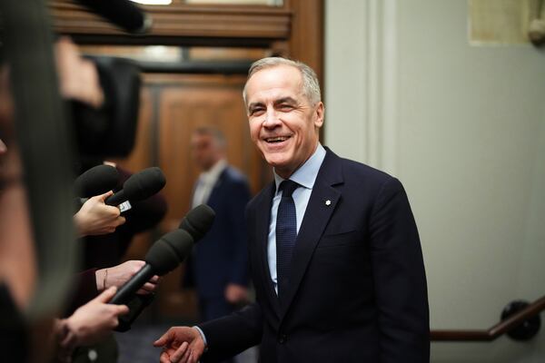 FILE - Canada Liberal Leader Mark Carney talks to the media as he leaves the prime minister's office and makes his way to a caucus meeting in Ottawa on March 10, 2025. (Sean Kilpatrick/The Canadian Press via AP, File)