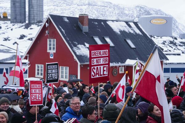 People recently protested against the push to control Greenland by the Trump administration outside of the U.S. consulate in Nuuk. ( Evgeniy Maloletka/AP)