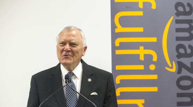 Gov. Nathan Deal speaks during a press conference Friday at the 1-year-old Amazon Fulfillment Center in Jefferson. State officials used the event to try charming Amazon executives, hoping to improve Georgia’s chances of landing Amazon’s “HQ2,” a $5 billion proposal that promises as many as 50,000 high-paying jobs. Metro Atlanta is on a shortlist of 20 candidates. (ALYSSA POINTER/ALYSSA.POINTER@AJC.COM)