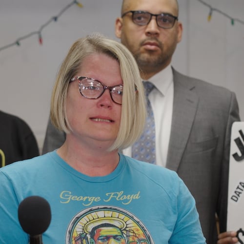 In this photo made from a video, Courteney Ross, George Floyd's girlfriend, speaks to reporters on Thursday, June 4, 2026, in Minneapolis, about a moment of silence honoring former Minneapolis police officer Derek Chauvin that was held at a state GOP convention. (AP Photo/Mark Vancleave) CORRECTION: Name corrected to Floyd instead of Flyod