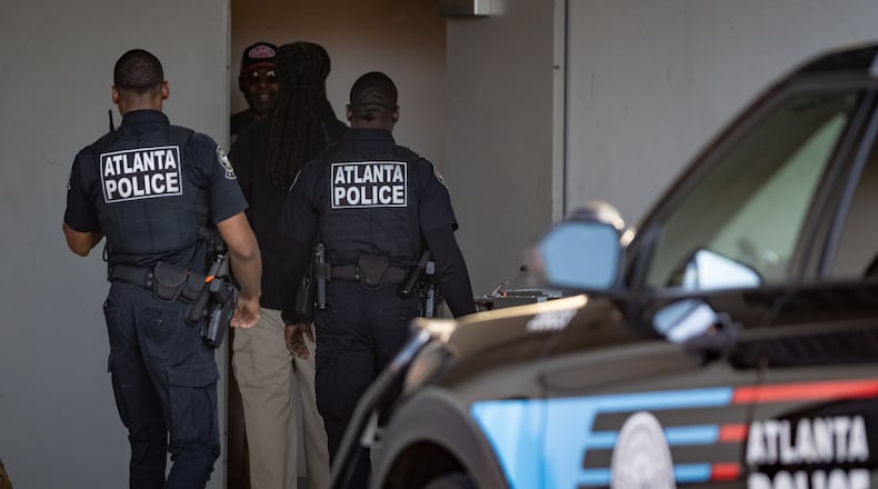 Atlanta police and homicide detectives investigated a fatal shooting at the 565 Hank by Windsor apartment complex April 9. Homicides in the city are down compared to the same time period last year. (Ben Hendren for the AJC)