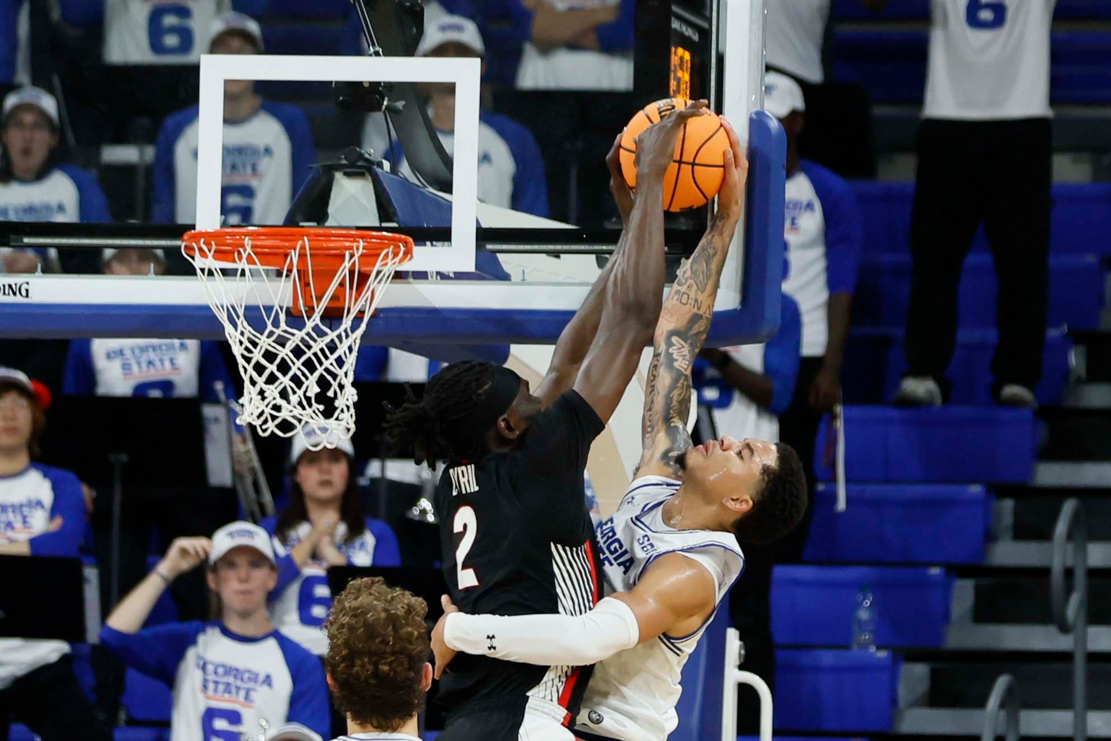 Georgia Bulldogs center Somtochukwu Cyril (2) blocks a shoot to Georgia State Panthers guard Jelani Hamilton (10) during the first half of an exhibition opener game at the Georgia State Convocation Center, Wednesday, October 15, 2025, in Atlanta.
(Miguel Martinez/ AJC)