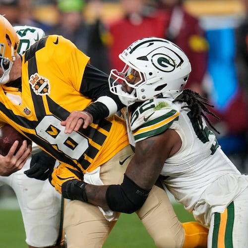 Green Bay Packers' Rashan Gary sacks Pittsburgh Steelers' Aaron Rodgers during the second half of an NFL football game Sunday, Oct. 26, 2025, in Pittsburgh. (AP Photo/Sue Ogrocki)