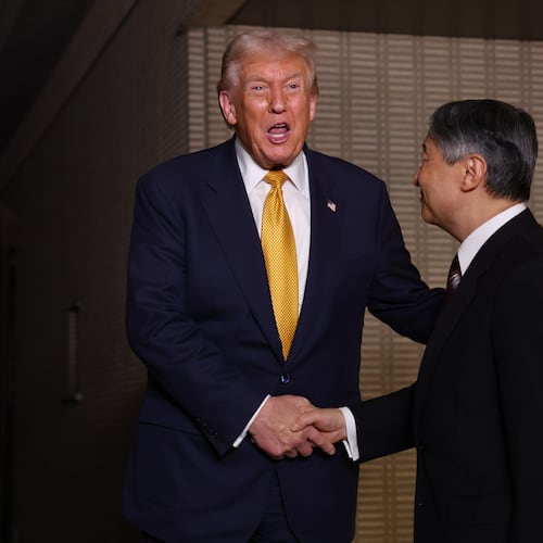 President Donald Trump, left, and Japan's Emperor Naruhito shake hands during their meeting at the Imperial Palace in Tokyo, Oct. 27, 2025. (Issei Kato/Pool Photo via AP)