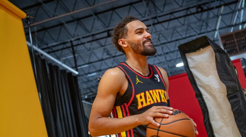 Hawks player Trae Young #11, poses for photos during media day. Hawks media day takes place on Monday, Sept 30, 2024 where media outlets including the Associated Press, Getty, NBA and many others gather to take photos, conduct interviews and gather footage.   (Jenni Girtman for The Atlanta Journal-Constitution)