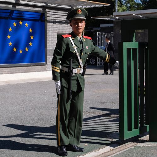 FILE - A Chinese paramilitary policeman stands guard at the entrance to the European Union Delegation to China compound in Beijing, China, on Oct. 14, 2023. (AP Photo/Ng Han Guan, File)