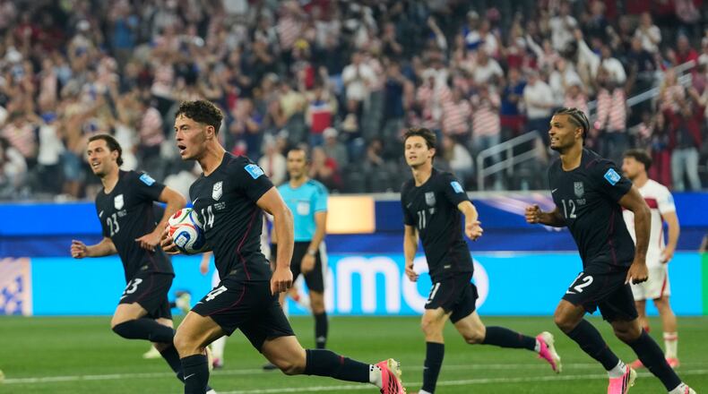 United States' Sebastian Berhalter (14) celebrates scoring his side's second goal against Turkey during the World Cup Group D soccer match in Inglewood, Calif., near Los Angeles, Thursday, June 25, 2026. (AP Photo/Andre Penner)