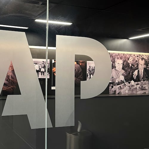 FILE - The Associated Press logo is displayed at the news organization's world headquarters in New York on April 9, 2025. (AP Photo/Aaron Jackson, File)