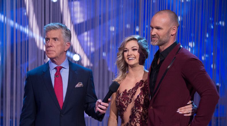 DANCING WITH THE STARS - "Episode 2406" - The eight remaining celebrities will dance to songs from some of the most popular boy bands and girl groups throughout history, and the men and women will also compete against each other in team dances, on "Dancing with the Stars," live, MONDAY, APRIL 24 (8:00-10:01 p.m. EDT), on The ABC Television Network. (ABC/Eric McCandless) TOM BERGERON, LINDSAY ARNOLD, DAVID ROSS