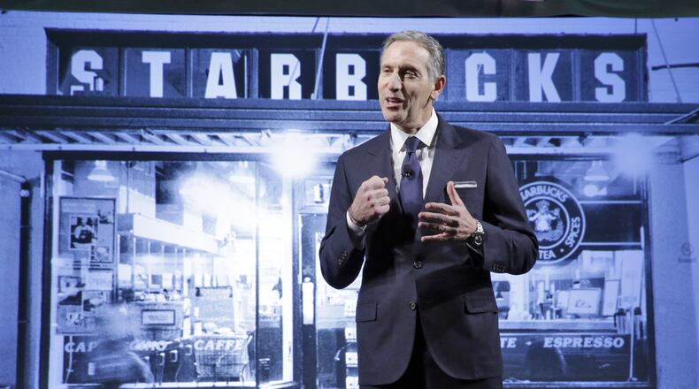 Starbucks Chairman and CEO Howard Schultz presents during the Starbucks 2016 Investor Day meeting, in New York, Wednesday, Dec. 7, 2016. (AP Photo/Richard Drew)