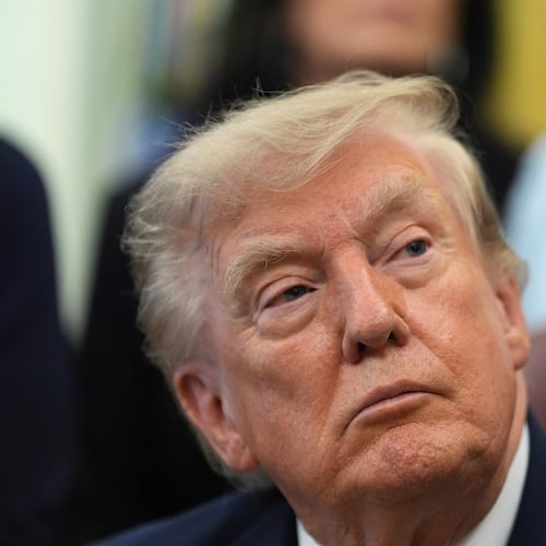 President Donald Trump listens during a meeting about military families, in the Oval Office of the White House, Monday, Aug. 3, 2026, in Washington. (AP Photo/Alex Brandon)
