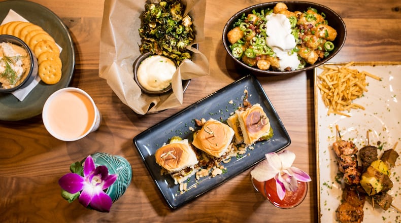 he Painted Duck menu features shareable small plates and items you can pick up and nosh. Photo credit- Mia Yakel.