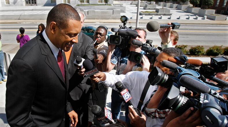 Vernon Jones, surrounded by news media outside the federal court in Atlanta  on April 1, 2010. (Curtis Compton / ccompton@ajc.com)
